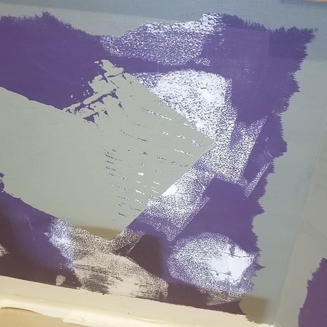 The first coat to cover the purple kitchen.